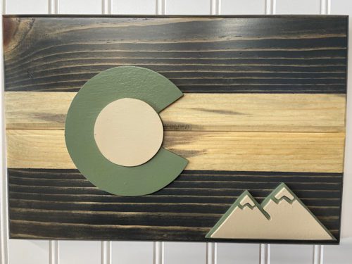 Colorado flag plaque with mountain